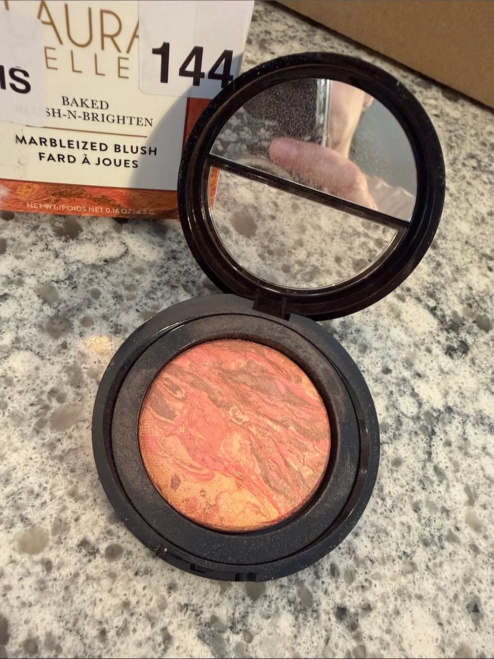 Laura Geller Marbleized Blush in Peachy Coral Swirl